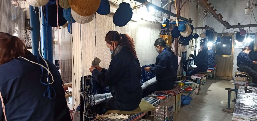Experienced craftspeople at work